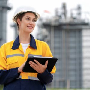 ola 16 Accomplished female engineer driving force in the world of innovation and market trends. Standing at power plant generator factory. Using laptop serving gateway to a wealth of data. Opportunity guided by Planning and a strong Project Management framework.